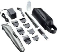 Andis 22725 Model BTF VersaTrim Trimmer 14-Piece Kit; Metallic silver finish; Easy handling and control for quick touch-ups and trimming at home; Perfect for beards, moustaches, sideburns and necklines; Super fine T-blade for extremely cose cutting and shaving; Numbered guide combs make it easy to remember preferred hair length; UPC 040102227257 (22-725 227-25) 