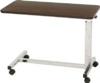 Drive Medical 13081 Low Height Overbed Table; Designed specifically for use with low beds with a 3.25 frame to floor clearance; Spring loaded lift mechanism, provides infinite adjustment from 19" - 28"; Walnut wood grain melamine top; Top can be raised with the slightest upward pressure; The frame is constructed with tubular steel and durable attractive finish; UPC 822383133935 (DRIVEMEDICAL13081 DRIVE MEDICAL 13081 LOW HEIGHT OVERBED TABLE) 