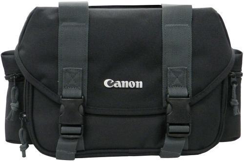 Canon 9320A021 300-DG Digital Gadget Bag (Black/Gray); Main compartment with 4, padded, touch-fastening dividers; Light gray, nylon interior for locating gear under low light; Exterior, front, zippered, accessory pocket with 2, inner, slip-in pockets; Large weather-flap closes with quick-release buckles connected to adjustable straps; 2 padded, zippered, exterior, accessory pockets, one on each side of bag; UPC 660685050600 (9320A021 9320A021 9320A021)