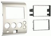 Metra 95-7406 Titan 04-07/Armada 04-05 DDIN Radio Adaptor, Double DIN Head Unit Provision, ISO Stacked Head Unit Provision, Painted Silver to match factory dash, Designed specfically for DDIN radio installations, Nissan Pathfinder Armada 2004-2005 and Nissan Titan 2004-2007 , Painted to match the factory color and finish, Retains the factory climate controls in the kit, UPC 086429190027 (957406 9574-06 95-7406) 