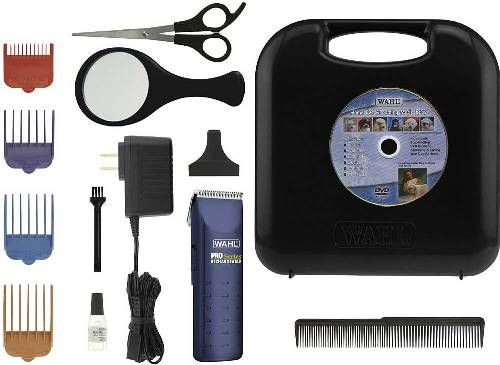 Wahl 9590-210 Pet Pro-Series Recharbeable 14-Piece Corded/Cordless Pet Clipper Kit; Blades are self-sharpening and made from high-carbon for durability and long life; PowerDrive Cutting System cuts the thickest hair; Includes rechargeable clipper, recharging unit, blade guard, handle storage case, oil, cleaning brush, scissors, medium comb, 4 guides (1/8