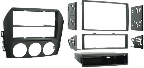 Metra 99-7506 Mazda MX-5 Miata 2006-2008 Dash Kit, Designed specifically for the installation of double DIN radios or two single DIN radios, Metra patented Quick Release Snap In ISO mount system with custom trim ring, Recessed DIN opening, Storage pocket with built in radio supports below the radio opening, High grade ABS plastic painted matte black contoured and textured to compliment factory dash, UPC 086429153732 (997506 99-7506)