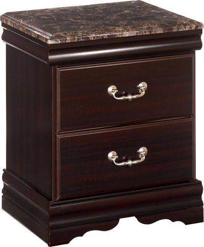 Ashley B179-92 Esmarelda Series Two Drawer Night Stand, Dark merlot finish over a replicated mahogany grain, High gloss thick faux marble tops, Traditional bail hardware with rosettes in a nickel color finish, Side roller glides for smooth operating drawers, Deeply shaped Louie Philippe style mouldings that wrap around the base and tucked under the top, Dimensions 21.57