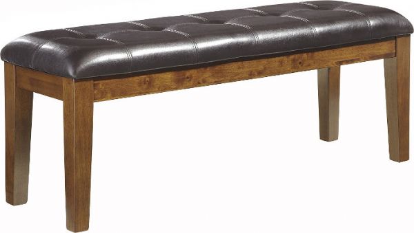 Ashley D594-00 Ralene Series Large Upholstered Dining Room Bench, Made with select acacia veneers and hardwood solids, Seat covers in brown faux leather available in medium brown, Dimensions 49.75