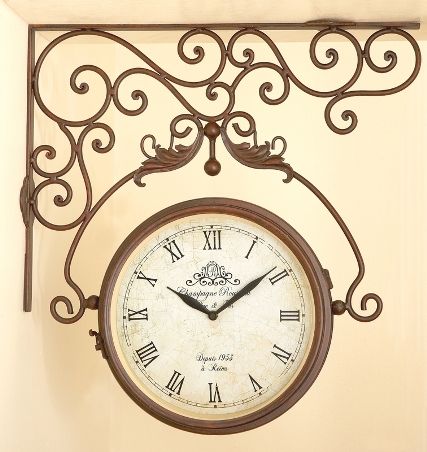 CBK Styles 44118 Clock Wall Mount Dual Size With Stamped Bracket Vintage Face, Antique Black and Brown Finish, Roman Numerals, The clock is battery operated with extremely accurate quartz action, Iron and Glass Material, Dimensions 8