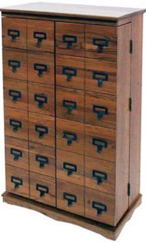 Leslie Dame CD-612LD Library Style Multi-Media Storage Cabinet, Dark Oak finish, Holds 612 CDs or 298 DVDs or 148 VHS Tapes, 18 total shelf spaces Shelves made of solid oak with lacquer finish, 15 adjustable shelves for door and center, Doors constructed with dovetail joints (CD612LD CD 612LD CD-612-LD CD-612LD CD-612 CD612)