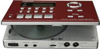 Tascam CD-GT2 Portable CD Guitar Trainer; CD-DA/CD-R/CD-RW disc playback; 10 second anti-shock memory; Comprehensive 128 x 64 dot matrix LCD display with graphical user interface; Album title/Track title indication by CD-Text; Elapsed Time/Remain Time display with bar meter; +16 to -50% pitch control in 1% steps; UPC 043774022694 (CDGT2 CD GT2 CDG-T2 CDGT-2) 