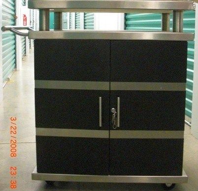 Brioso COFFEECART1 Prototype Coffee Cart - Only One Unit Ever Built, Heavy duty steel construction, All stainless steel exterior, All stainless steel shelving, Commercial wheels/casters, Key lock, Wood veneer finish, Compliant with NSF rules but not NSF certified, 30