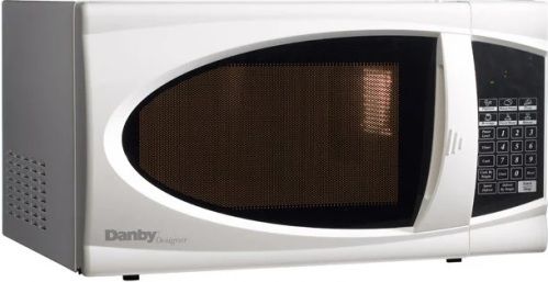 Danby DMW799W Designer Series Countertop Microwave, 0.7 cu. ft. - 20 litre capacity microwave, 700 watts of cooking power, Oval door design, Electronic controls, 10 power levels, Easy to read LED timer/clock, Automatic oven light & turntable, UPC 067638901215 (DMW799W DMW-799-W DMW 799 W)
