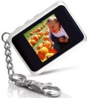Coby DP-151WHT Digital Photo Keychain, White, 1.5-Inch CSTN LCD full-color display, Display Resolution 128 x 128, Displays JPEG, GIF, and BMP photo files, Photo slideshow mode, Integrated 16MB NOR Flash, Integrated Rechargeable lithium-ion battery, USB 2.0 Hi-Speed port for fast file transfers, 3hr Photo View Time (DP151WHT DP 151WHT DP-151-WHT DP151WHITE DP-151 DP-151W DP151) 