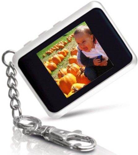 Coby DP-151WHT Digital Photo Keychain, White, 1.5-Inch CSTN LCD full-color display, Display Resolution 128 x 128, Displays JPEG, GIF, and BMP photo files, Photo slideshow mode, Integrated 16MB NOR Flash, Integrated Rechargeable lithium-ion battery, USB 2.0 Hi-Speed port for fast file transfers, 3hr Photo View Time (DP151WHT DP 151WHT DP-151-WHT DP151WHITE DP-151 DP-151W DP151)