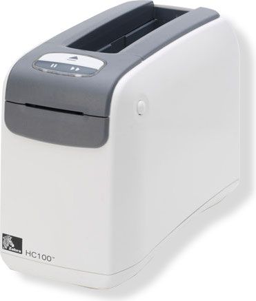 Zebra Technologies HC100-3001-1000 Model HC100 Healthcare Wristband Printer with Serial and USB Ports; Quick and easy wristband cartridge loading; Automatic print speed setting up to 4 ips depending on installed cartridge; Direct thermal printing of barcodes, text and graphics; Dual-wall frame, impact-resistant plastic; ZPL or ZPL II programming language; 32 bit RISC processor;  UPC 648162672279 (HC100-3001-1000 HC100-30011000 HC1003001-1000 HC10030011000)