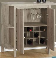 Monarch Specialties I 2323 Dark Taupe With Bottle and Glass Storage Home Bar; 2 door cabinet style closed storage; Suspended stem glass holder (23"Lx15"Dx12"H); Bottle storage for up to 15 bottles (removable wine rack) 23"Lx15"Dx14"H; 2 open shelves on each side (top: 15"Lx5"Dx14.25"H;bottom: 15"Lx5"Dx14"H); Made in MDF, Particle Board, Wood, Laminate; Weight 72 Lbs; UPC 878218007438 (I2323 I 2323) 