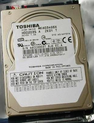 Toshiba MK6034GSX Hard Disk Drive 2.5-inch, 60GB of Storage capacity, 5400RPM Rotational Speed, 150 MB/sec Transfer Rate to Host, 2ms Track-to-track Seek, 12ms Average Seek Time, ATA-7 Interface, 8MB Buffer Size, 9.5mm High, 300000 MTTF Hours (MK-6034GSX MK 6034GSX MK6034-GSX MK6034 GSX)
