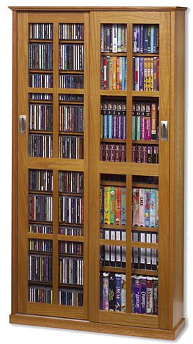 Leslie Dame MS-700 Glass Sliding 2 Door Multi-Media Storage Cabinet Natural Oak, 700 CDs or 336 DVDs or 196 VHS Videocassettes or any combination of these, The tempered glass door panels and recessed nickel handles make this an attractive addition to any home or office (MS700 MS 700)