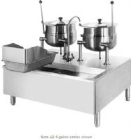 Cleveland SD-1200-K612 Six and Twelve Gallon Tilting 2/3 Steam Jacketed Direct Steam Kettles with Modular Stand, 50 PSI steam jacket and safety valve rating, One 6 gallon and one 12 gallon kettle, Modular Base, Floor Model Installation, Partial Kettle Jacket, Steam Power, 0.5" Steam Inlet Size, Tilting Style, Double Kettle, 0.38" - 0.5" Water Inlet Size, 18" Base Height, 15.38" - 22.25" Kettle Height, UPC 400010764921 (SD-1200-K612 SD 1200 K612 SD1200K612) 
