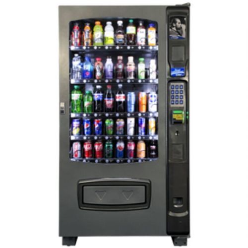 Seaga ENV5B Soda Vending Machine with Changer and Bill Acceptor; Convertible shelving; Removable trays with first in/first out (FIFO) product loading capability; Oversized product bin for larger products; Dual spirals standard in two trays; Dual coils are standard; All metal adjustable product trays tilted thirty degrees for simplified servicing; 4.3 in. LCD color display, completely programmable; Braille equipped number keypad (SEAGAENV5B SEAGA ENV5B SODA VENDING MACHINE)