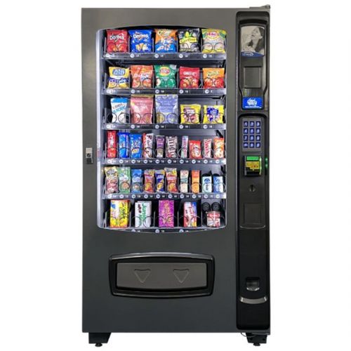 Seaga ENV5C Snack Vending Machine; Dynamic LCD Display; Braille Back-lit Keypad; Dual Coils; Brilliant 1000 Lumen Power LED Lighting; Contoured Bezel; Motorized Coin Return System; Convertible shelving; Removable trays with first in/first out (FIFO) product loading capability; Oversized product bin for larger products; Dual spirals standard in two trays; Dual coils are standard (SEAGAENV5C SEAGA ENV5C VENDING MACHINE) 