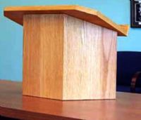 Amplivox SN3150 Golden Oak Wooden Desktop Podium Stand, Contemporary Solid Wood Lectern, The reading table of this podium measures 26 3/4" w x 15 3/8" d with a 1 1/2" h x 26 3/4" w ledge to hold your reading material, For desktops and tables, stands 20" high and angles down 15" (SN-3150 SN 3150) 