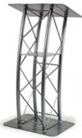 Amplivox SN3195 Silver Aluminum Curved Truss Lectern, The reading table measures 23.5"w x 16.5"d, enough room for an open 3-ring binder and the 1"h lip keeps notes from sliding off the angled surface, 11"x11" shelf is welded between the tubes 26.75" above the base (SN-3195 SN 3195) 