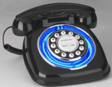 Telemania TBIRD-PHONE  neon desk telephone, Push button dialing in a rotary fashion plate, Blue glowing neon circles the rotary dialing plate, Tone/pulse optional, External transformer, Redial/flash (TBIRD  PHONE      TBIRDPHONE)