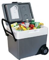 Koolatron W65 Kargo Wheeler 12V Cooler/Warmer with Wheels & Handle, Metalic colour, Capacity 42 - 355 ml (12 oz.) cans 31L (33 qts.), Unique split-lid design promotes energy conservation and accessibility, All the works are in one portion of lid, as is all the venting so the exterior sides of the cooler can be packed tightly against luggage (W-65 W 65) 