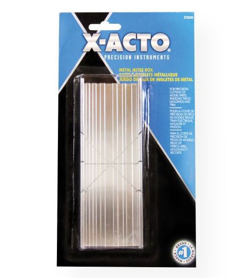 X-Acto X-75330 Metal Mitre Box; Slotted sides guide razor saw for accurate mitres of model parts, railroad track, moldings, and trim; Formed grooved base holds material in place in widths of 3/16
