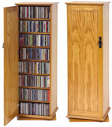 Leslie Dame CDR-500 2 Sided Revolving Multimedia Cabinet With Doors Oak, CDs the unit will hold: 500, DVDs the unit will hold: 244, Video Tapes the unit will hold: 122 (CDR-500W CDR500 CDR 500 CDR-50)